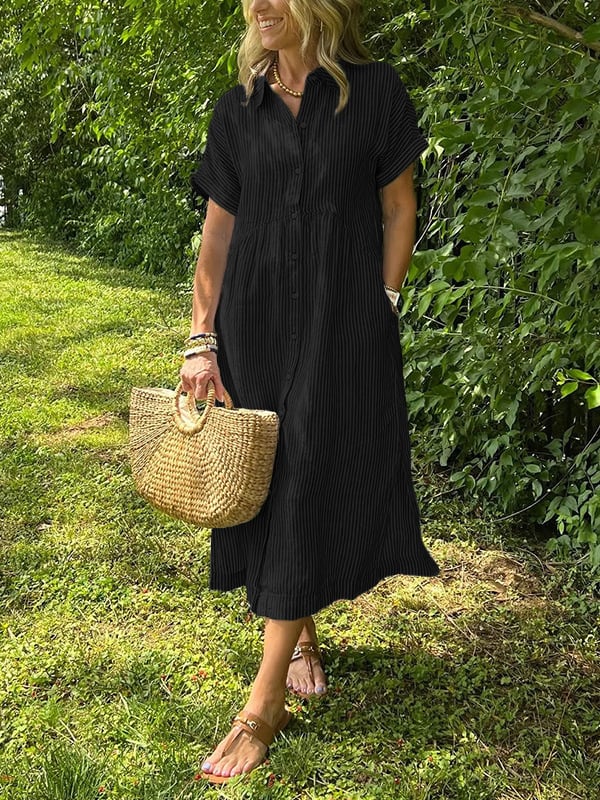 New button-up dress with striped flaps at the bottom | With functional pockets